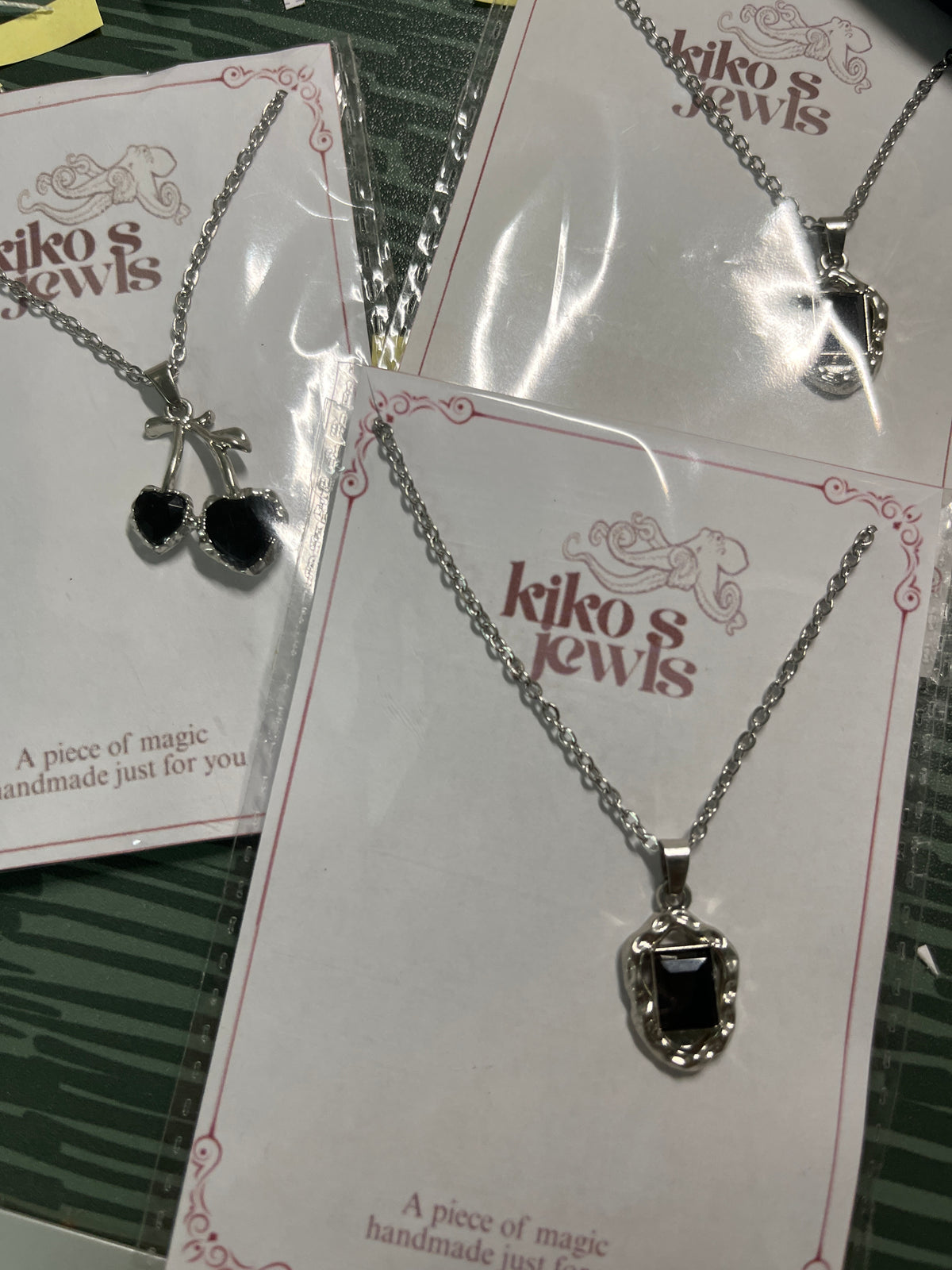 Cherry and oval black necklace