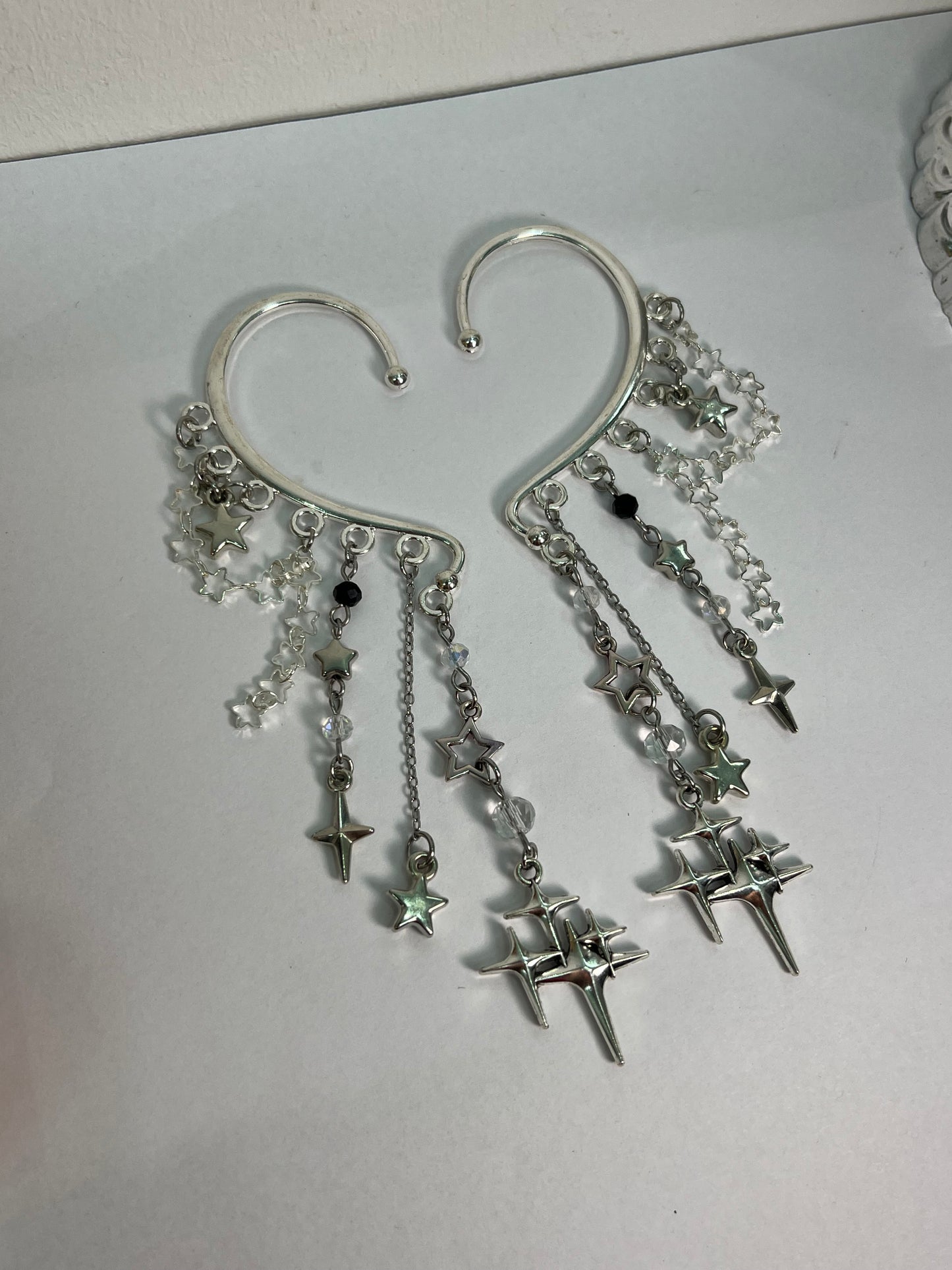 Silver spark ear cuff